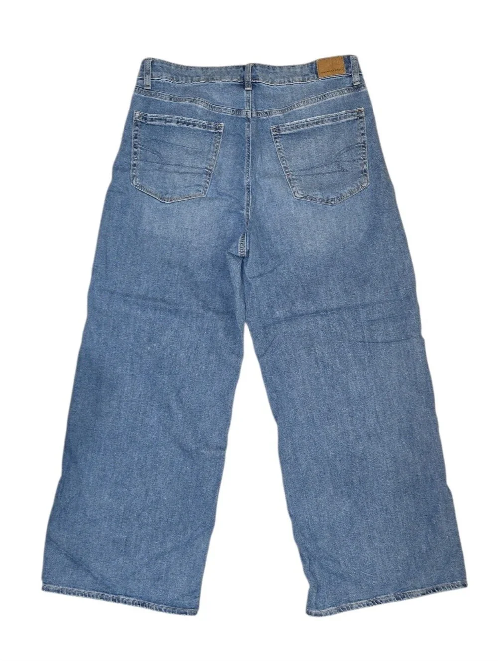 AMERICAN EAGLE HIGH-RISE BAGGY WIDE LEG JEANS. SIZE 12. MEDIUM WASH.